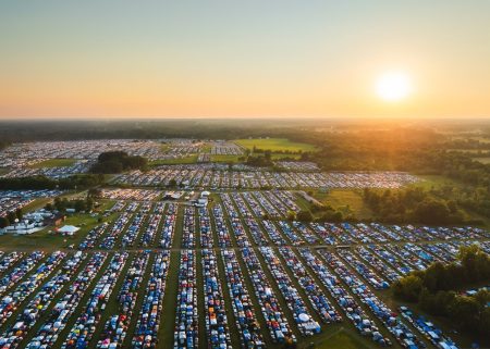 Aerial view of the Bonnaroo festival grounds at sunset.