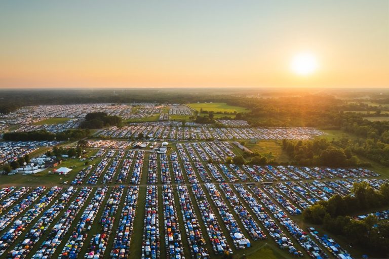 Aerial view of the Bonnaroo festival grounds at sunset.